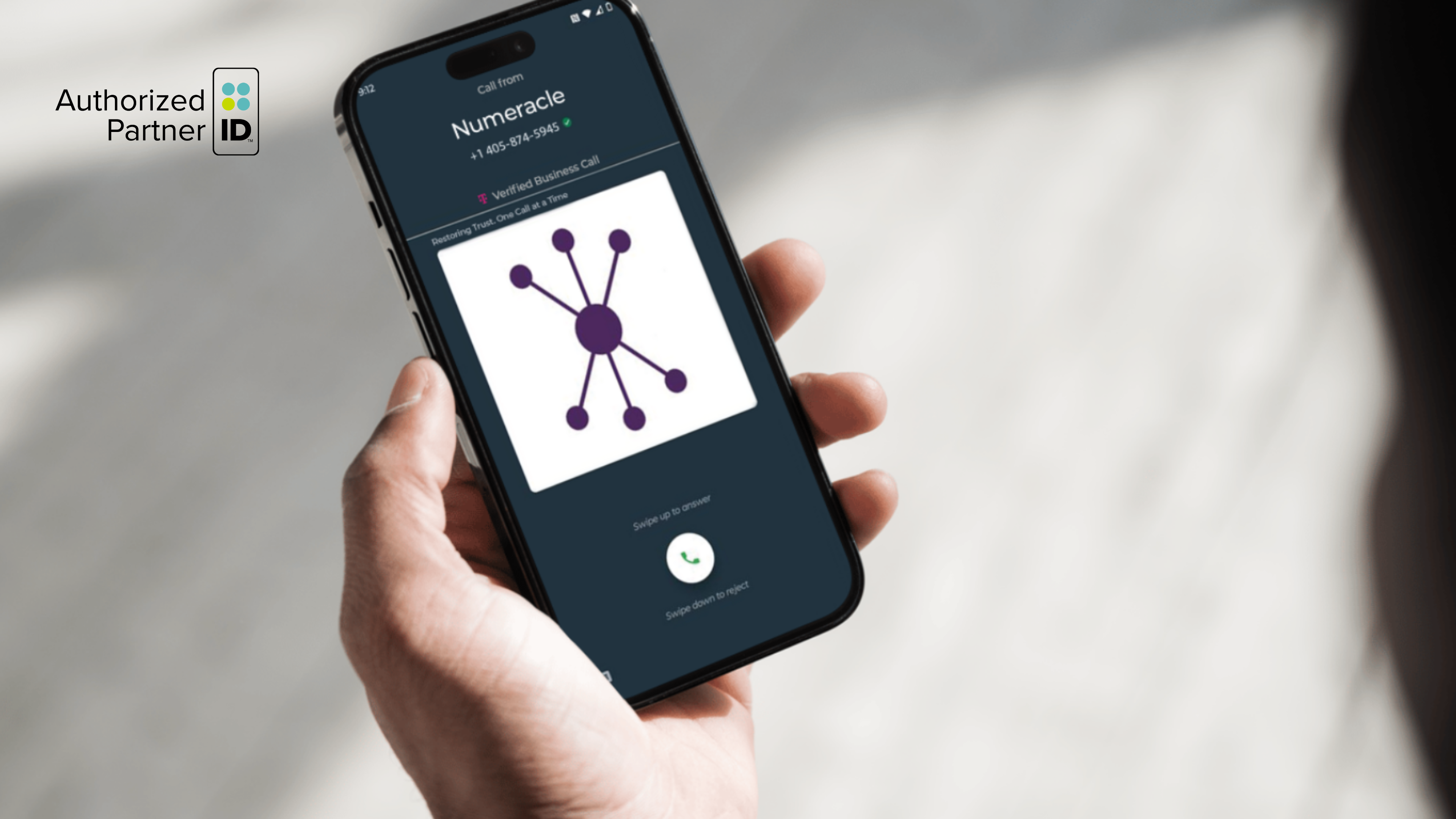 Hand holding a smart phone device with a Numeracle BCID call ringing through with caller name, call reason, and Numeracle logo